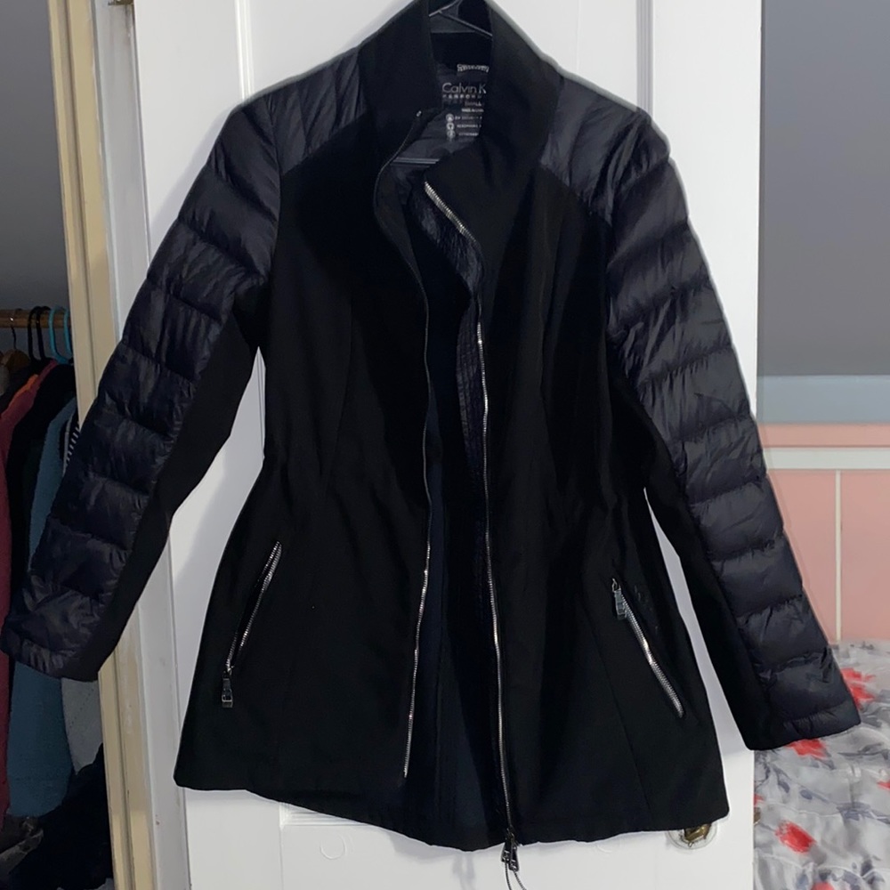 Light stylish jacket. Brand- Calvin Klein. Color- Black, silver zippers. Size- S